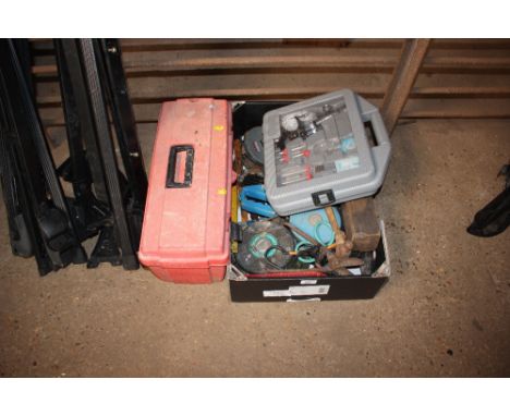 A box and a plastic tool box of various tools