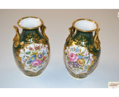A pair of Copeland Spode floral decorated vases 
