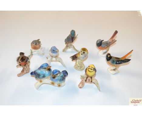 A collection of Goebel porcelain bird ornaments 