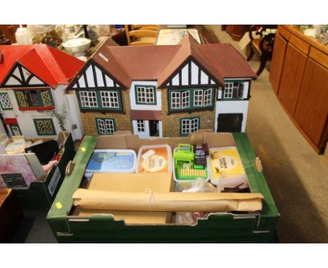 A vintage dolls house (lacking contents) and a box of various dolls house furniture and decorative items 