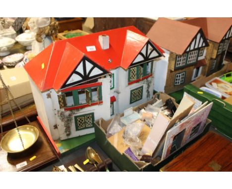 A vintage dolls house and part contents, and a box of various dolls house furniture and decorative items 