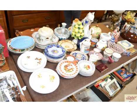 A large quantity of various sundry china to include side pates, pottery cat, biscuit barrel and cover, candlestick, tile, cha