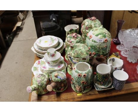 A quantity of J &amp; G teaware and side plates; various other plates; a quantity of "The Village Collectables" jars and cove