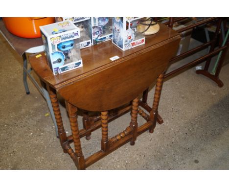 A good quality oak gate leg tea table 