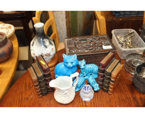 A pair of book ends; Oriental vase, cat ornaments; a wooden trinket box with carved top; a Parian ware Portmeirion jug