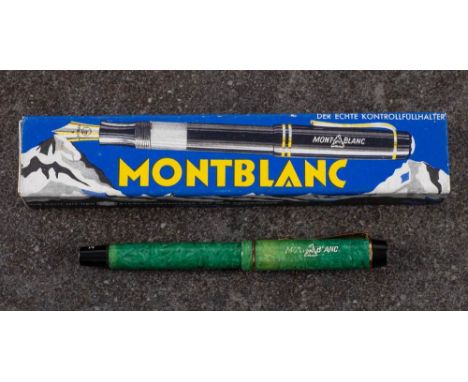 Montblanc. A Montblanc 322 Jade Green fountain pen: 2 14c gold nib,  green and black cap with clip, single band and white tex