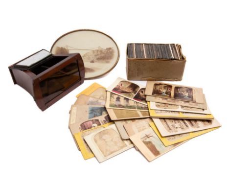 A small collection of various stereoscope cards: including three 'Optical Transpositions' cards,  several French hold to ligh