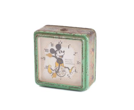 An Ingersoll Mickey Mouse alarm clock, circa 1930s:   green square tin case with transfer border, 10 x 10cm. 