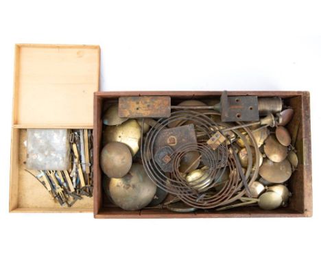 Twenty-five English bracket and wall clock pendulums: along with various bobs and rods, eight longcase clock brass pendulum b