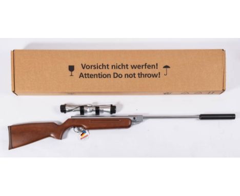 A Weihrauch HW 35 K .177 calibre break barrel air rifle: serial number 2222703 with stainless steel finish and wooden stock ,