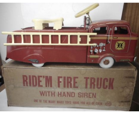 Marx, a tinplate 'Ride'm Fire Truck' : the pressed steel ride on body with lithographed detail, steering wheel, hand operated
