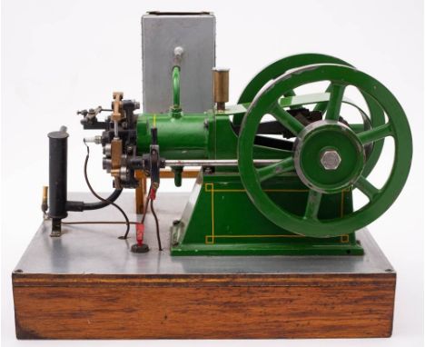 A scale model of a four stoke horizontal engine, double 6 1/2 inch  six-spoked flywheels,  green chassis with yellow coach li