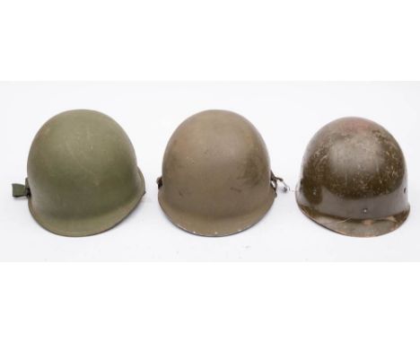 Two M1 style steel helmets and a fibreglass M1 style civil defense helmet (3) 