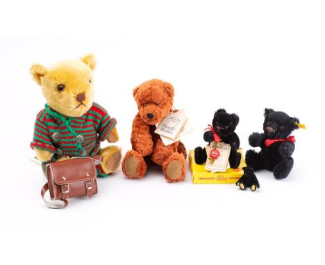 A group of five various Teddy bears; comprising a small black Steiff bear, a Deans Ragbook Company Limited edition Binkie Bea