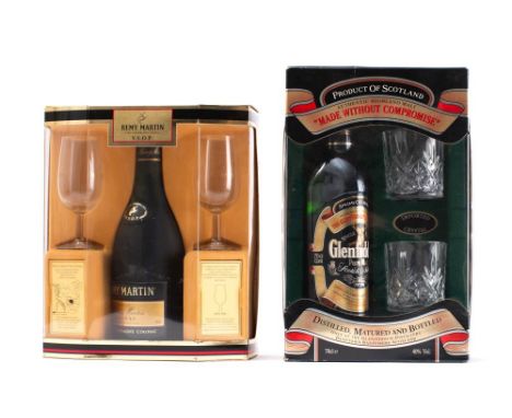A bottle of Remy Martin Cognac VSOP in presentation glass pack, together with a similar bottle of Glenfiddich Pure Malt Whisk