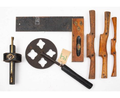 A 19th century iron waywiser,: together with a brass mounted mortice gauge, a Smallwood square with MOD broad arrow mark and 