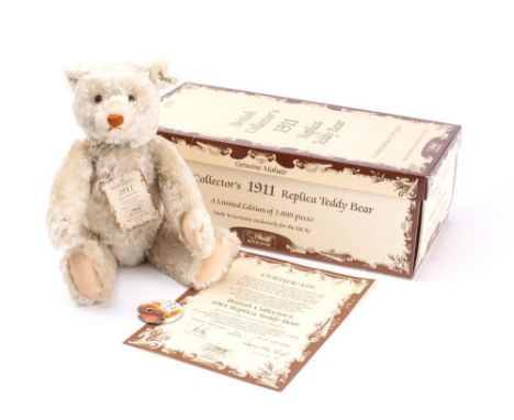 A Steiff British Collectors replica 1911 Teddy bear: No. 01616, glass eyes with stitched nose and mouth over plush jointed bo