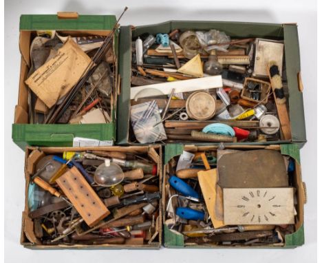 Three boxes of various watch and clock making tools: including files, broaching tools, screwdrivers, watchmaking hammers, eye