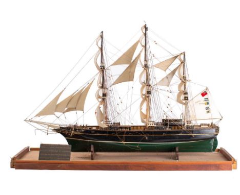 A scale model of the Cutty Sark: fully rigged over detailed deck with davits, lifeboats and fixtures and fittings, the hull p