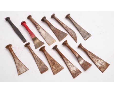 A group of twelve  steel caulking tools: