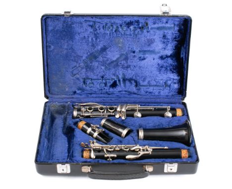 A Bosey &amp; Hawkes clarinet: serial number '267317' in fitted hard shell case.