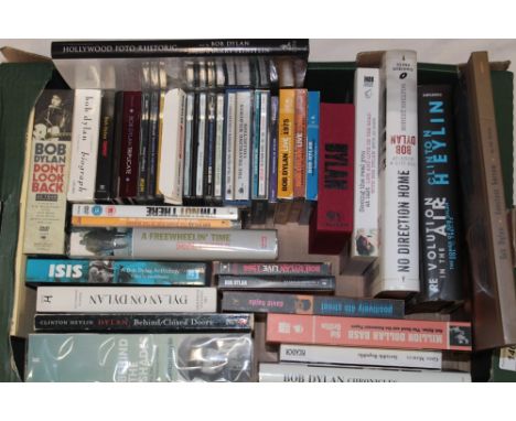 A selection of Bob Dylan related volumes including "No Direction Home, A Freewheelin' Time" and others together with a select