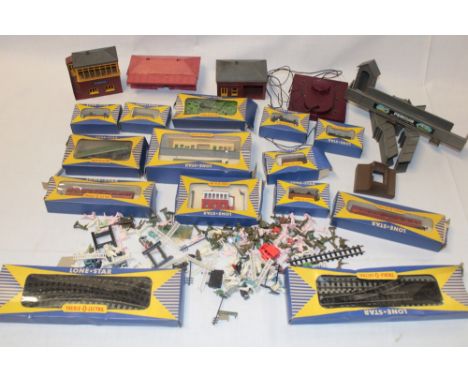 A selection of Lone Star Treble-O railway items including boxed diesel train, various boxed goods wagons, track, a selection 