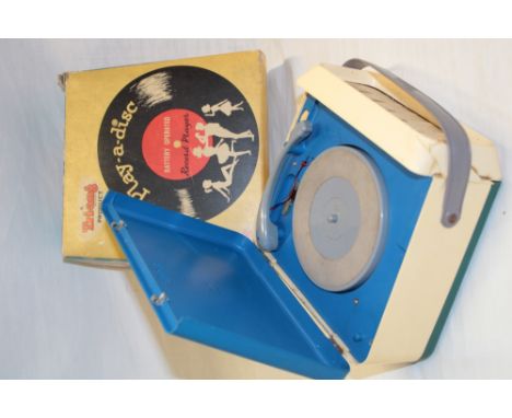 A Triang "Play-A-Disc" battery operated toy record player in original box