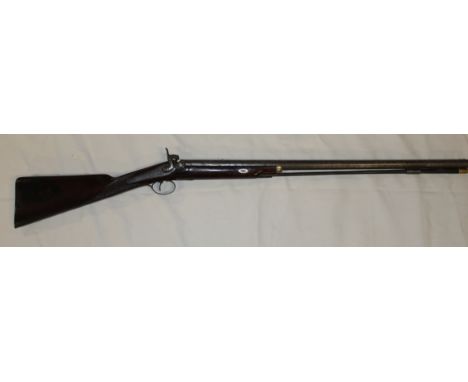 A 19th Century 12 bore double barrelled percussion sporting gun by Holland and Burford with 30" Damascus steel barrels, engra