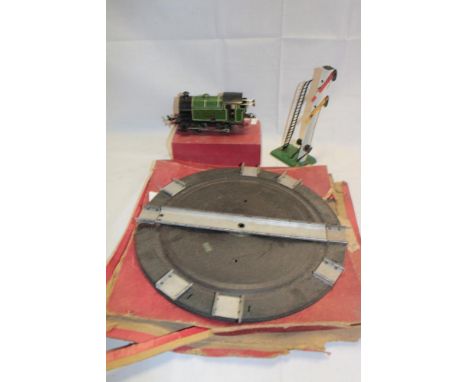 A Hornby 0 gauge LNER clockwork reversing tank engine in original box, boxed turntable and a Hornby 0 gauge signal 