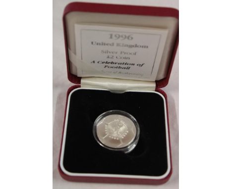 A 1996 silver proof £2 coin in celebration of football, cased with certificate 