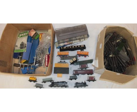 A selection of 00 gauge railway including 2 Hornby BR locomotives, a selection of various rolling stock, boxed Dublo points a