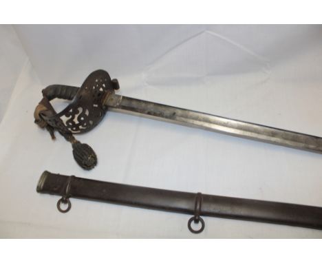 A Victorian Engineers Officer's sword with 34" etched steel blade by Wiseman of London, steel guard with wire-bound fish skin