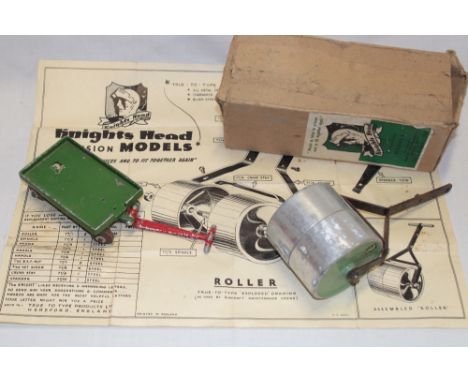 A Knights Head toy garden roller with instructions and original box and a similar Knights Head garden trolley (2) 