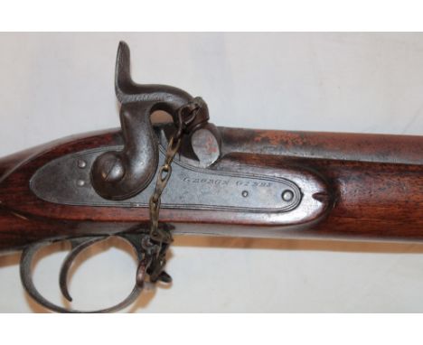 A 19th century Enfield Percussion rifle by George Gibbs of Bristol with 33" steel barrel, engraved steel lock with polished w