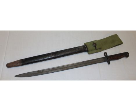 A First War 1907 pattern Lee Enfield bayonet with single edged blade dated 1907 in leather scabbard with webbing frog 