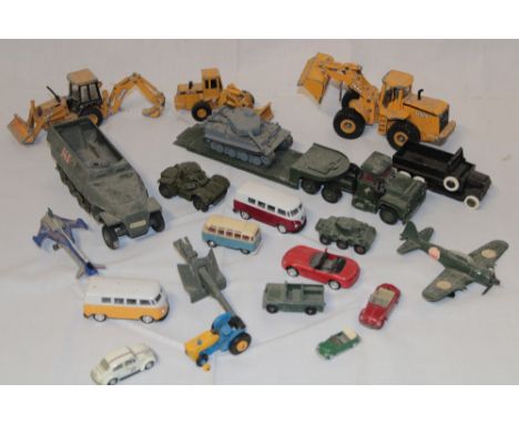 A selection of various military vehicles including Dinky armoured car, Corgi tank transporter and various others etc 