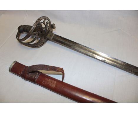 A Victorian Rifle Volunteers Officers sword with etched presentation blade "Lieut. J. Teague from from T. Teague" (of the Tru