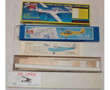 Four boxed model gliders/aircraft kits including West Wing Piper Cub, Sterling models Sukhoi, RN models Old Timer Free Flight