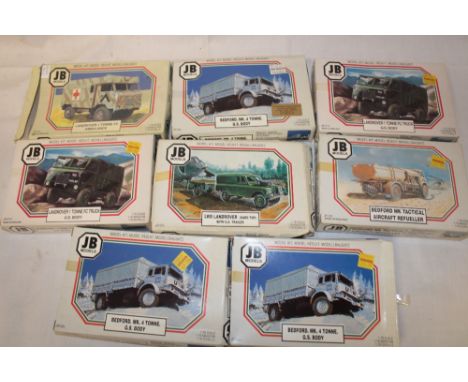 Eight JB Models 1:76 scale model kits including Landrover ambulance, Bedford MK4, Landrover one tonne FC truck, LWB Landrover