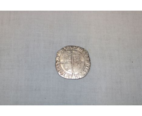 An Elizabeth I silver hammered shilling with rare error inverted A/V to reverse, mint mark KEY