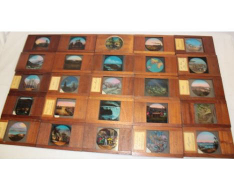 A fitted box containing a selection of Victorian magic lantern slide plates including 44 coloured scenic plates in mahogany m
