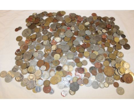 A box containing a large quantity of mixed Foreign coins including some silver examples