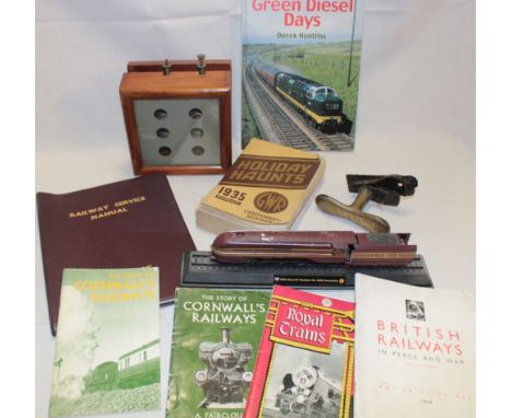 A wooden railway signal indicator, GWR 1935 Holiday Haunts brochure, Devon Railways brass door handle etc