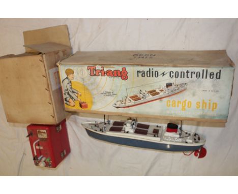 A large Tri-ang British Adventurer cargo ship in original box together with an accompanying boxed metal radio master control 