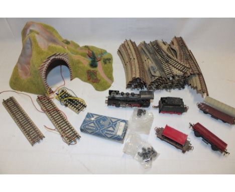 A Marklin 00 gauge electric 4-6-0 locomotive and tender, 2 goods wagons, track and various accessories 
