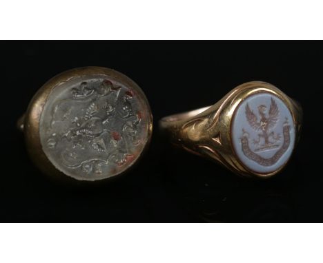 A gold seal ring along with a brass and glass seal fob. Ring size R (4.36g).  Ring cut in two places (probably re-sized), mis