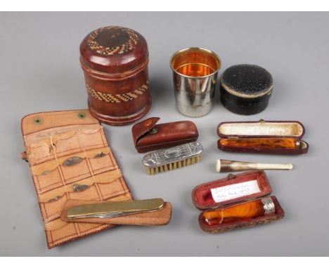 A collection of antique items including Victorian silver moustache pocket comb, 9ct gold rimmed cheroot holder, bone cheroot 