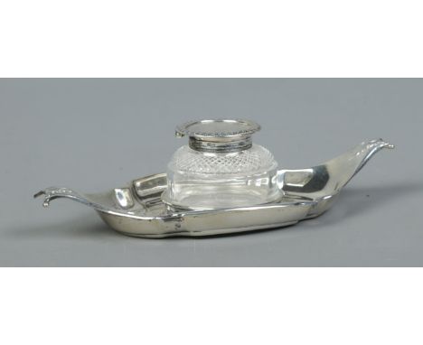 A Victorian silver and glass inkwell on boat shaped stand. Assayed Birmingham 1892 by Samuel Walton Smith. Tray weight 58g.  