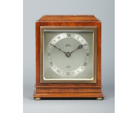 A vintage oak cased Elliott mantel clock. Retailed by Burrell, Sheffield. Height 16cm.  